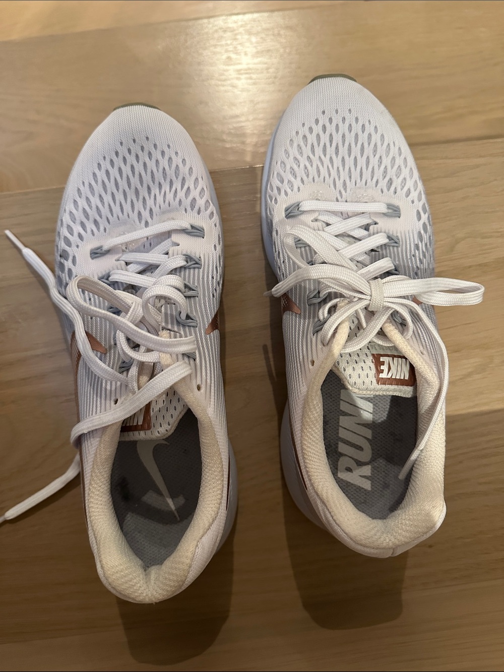 Women’s Nike White Running Shoes with Rose gold swoosh
